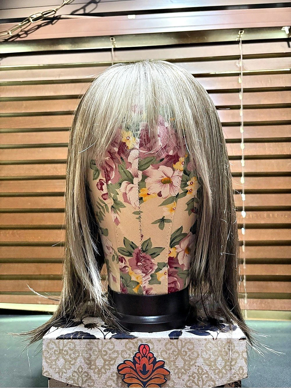 Godiva’s Secret Wigs Hair Topper with attached clips.